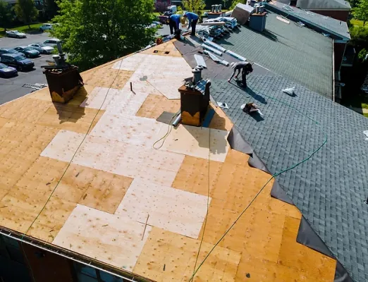 Exposed roof decking inspected before the new roof goes on